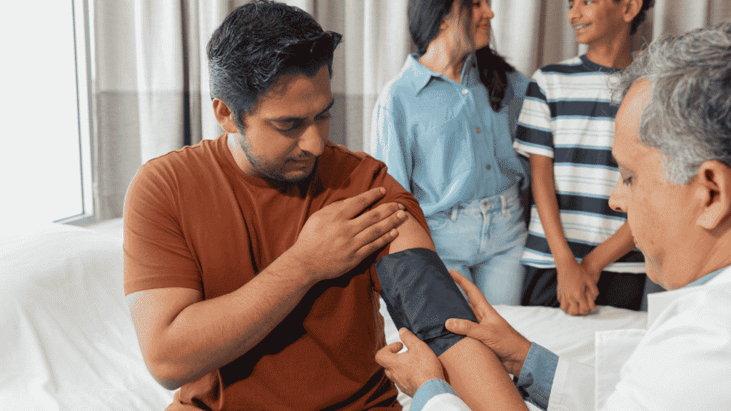a doctor Monitoring to Understanding to Control Hypertension a man