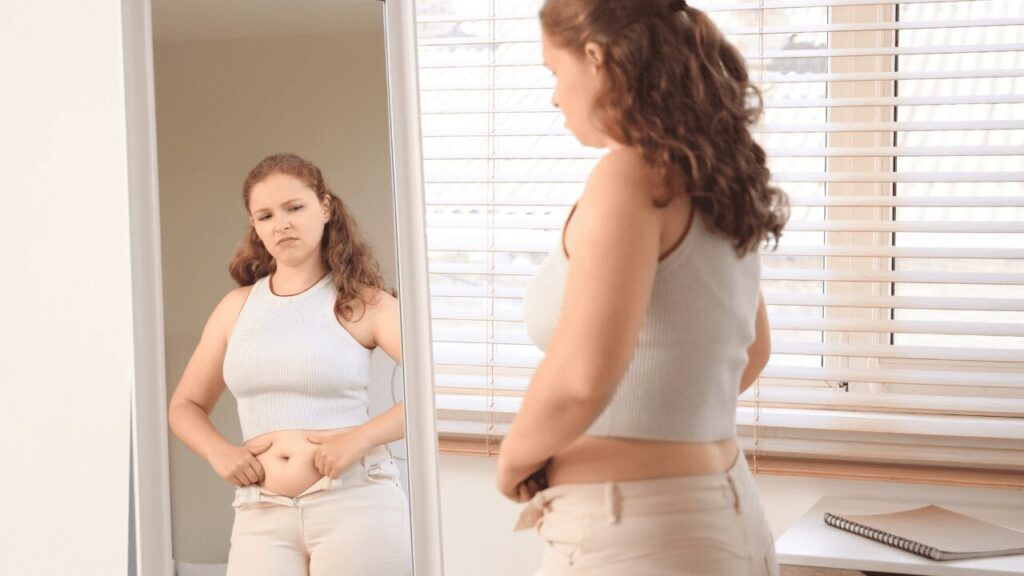 a women increase belly fat