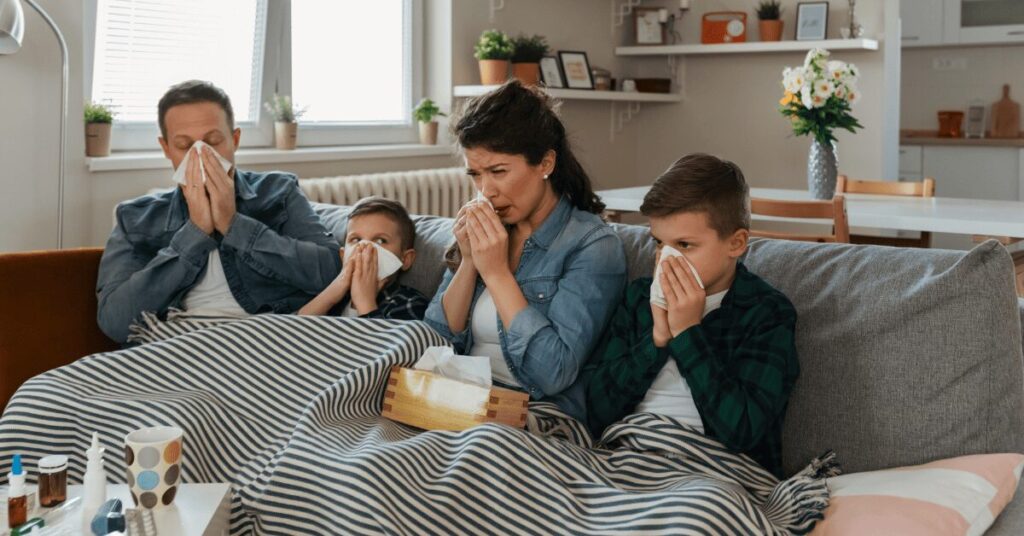 a family suffering from sneezing