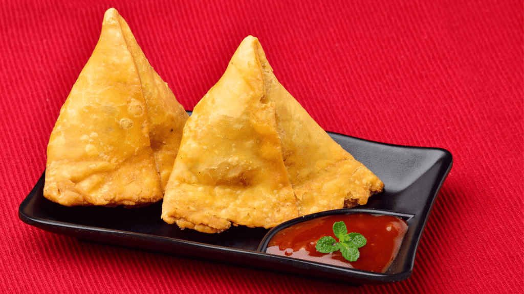 Hot Samosas with red Chutney